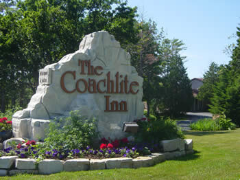 Coachlite Inn and Suites Logo